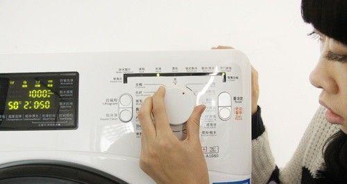解决海信滚筒洗衣机门打不开的问题（快速解决海信滚筒洗衣机门无法打开的方法）