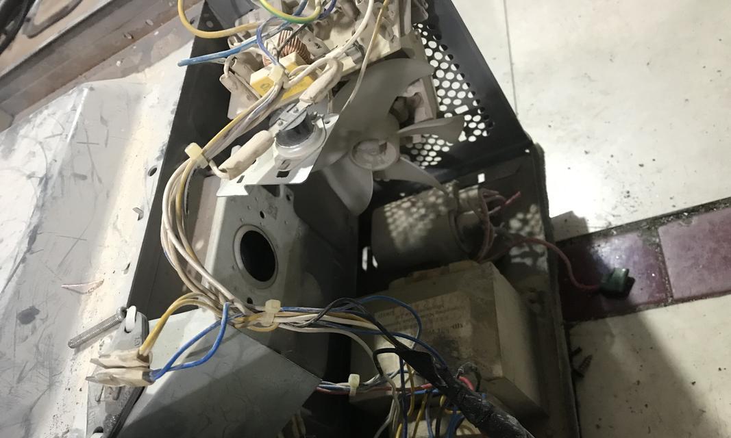 微波炉不加热，自己动手修吧（快速解决微波炉不加热问题）